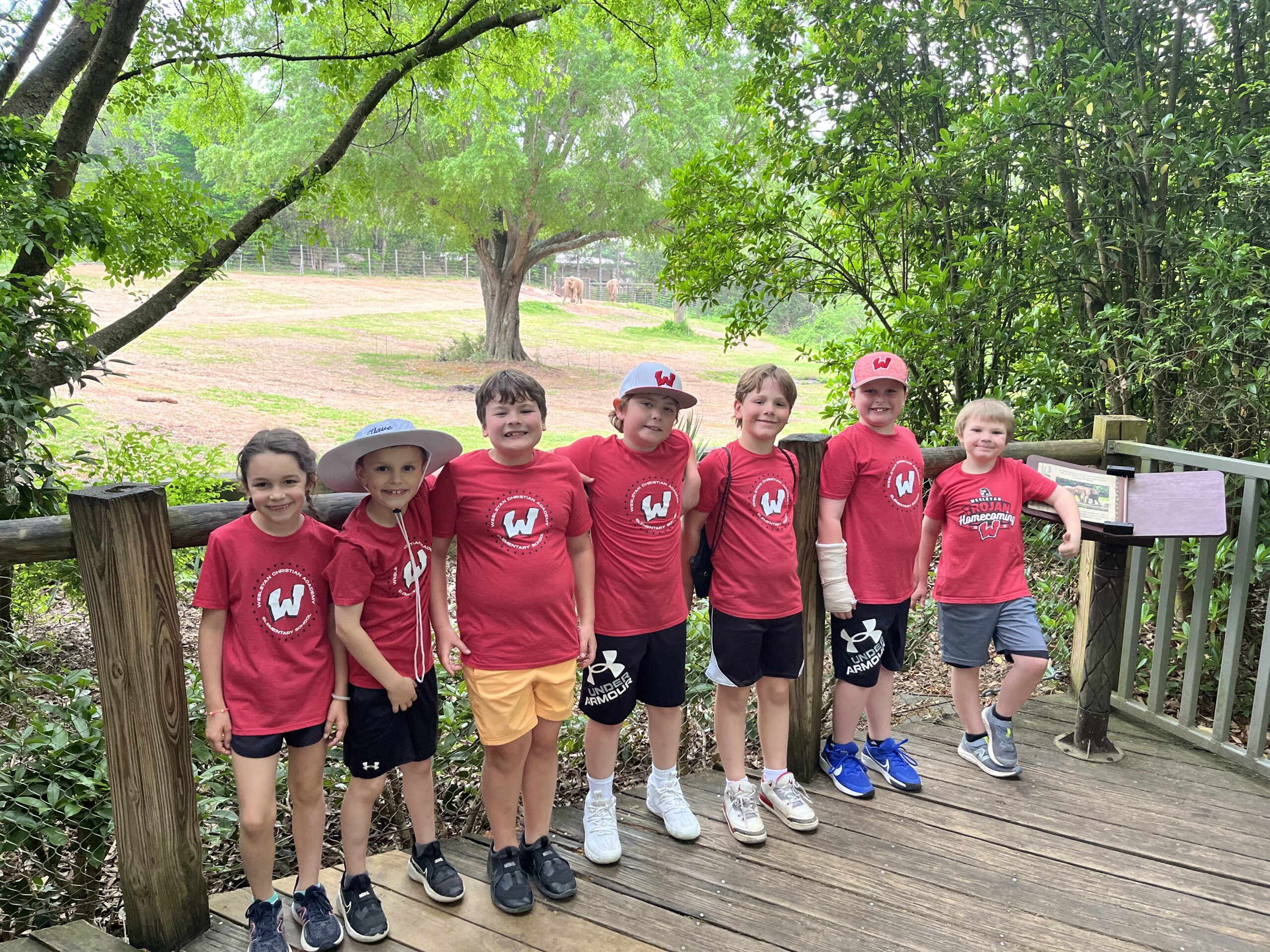 Wesleyan elementary students together outdoors