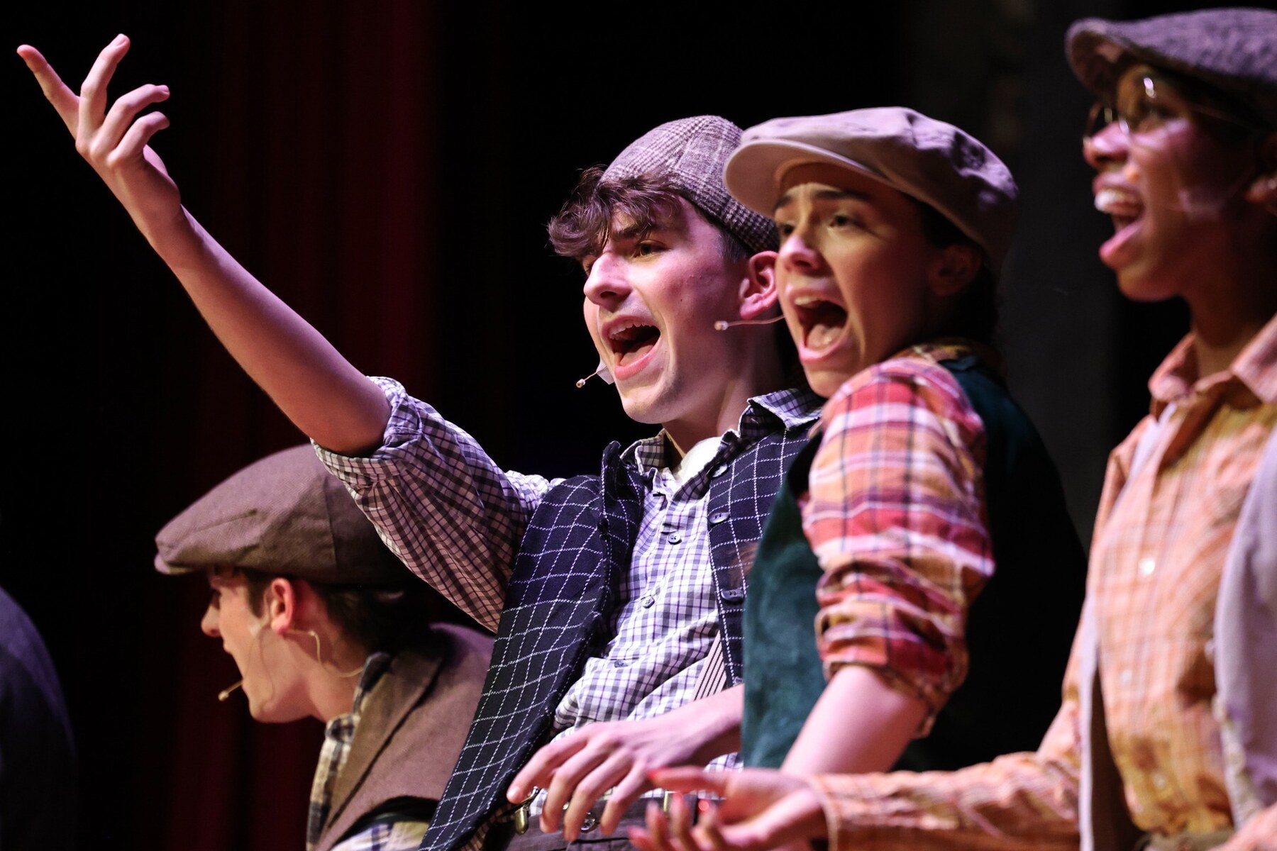 Wesleyan students performing under the Performing Arts Center stage lighting